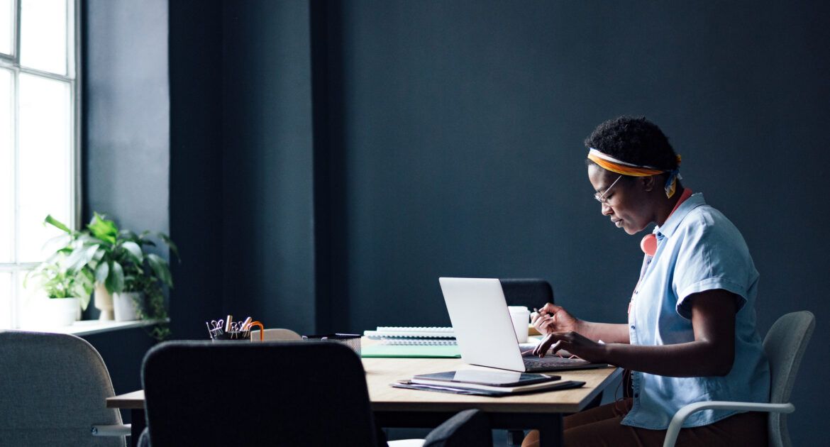 University Student Working On A School Project In The Library