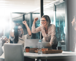 Team celebrating, showing employee happiness